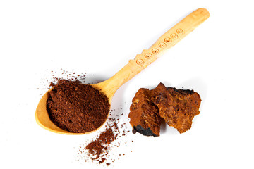 Wall Mural - Chaga Mushroom Powder with wooden Spoon - Natural Minerals