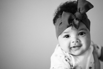 2 Months Old Baby Girl with green head scarf wrap black and white