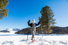 A Six Year Old Boy With Snow Shoes And Ski Poles,Valle Caldrea