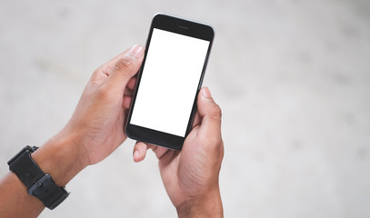 Wall Mural - cropped shot view of man hands holding smart phone with blank copy space screen for your text messag