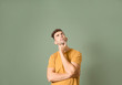 © Pixel-Shot - Thoughtful man on color background