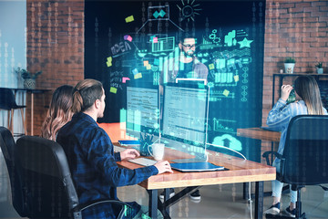 team of programmers working in office