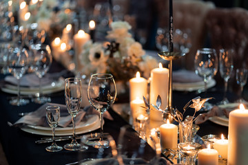 festive table setting candles for wedding party