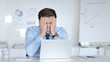 © stockbakers - Young Businessman Upset by Loss at Work