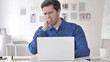 © stockbakers - Sick Casual Adult Man Coughing at Work