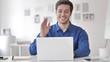 © stockbakers - Online Video Chat by Casual Adult Man at Work