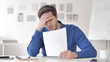 © stockbakers - Young Man Reacting to Failure of Contract