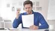 © stockbakers - Casual Adult Man Reacting to Failure of Contract