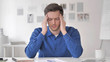 © stockbakers - Headache, Tense Casual Adult Man with Head Pain at Work