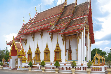 Buddhist temple with Buddha statues on a green background