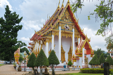 Buddhist temple with Buddha statues on a green background