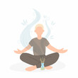Young man sitting in lotus pose with aroma diffuser. Aromatherapy and relax. Self care at home.