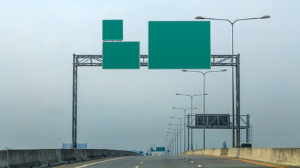 Blank green RoadSign before the highway