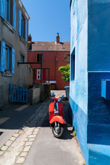 Wall Mural - little colorful alley with vintage scooter in Reze Trentemoult village France