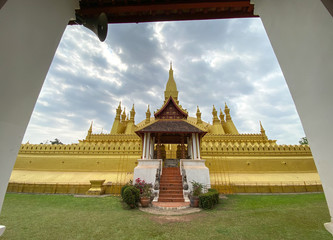 Wall Mural - Ancient Buddhist pagoda in Vientiane, Laos