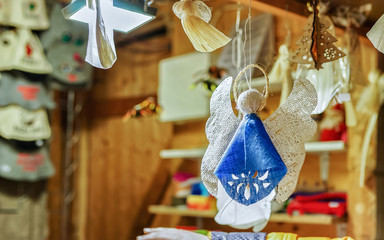 Poster - Handmade linen angel hanging at the Riga Christmas market