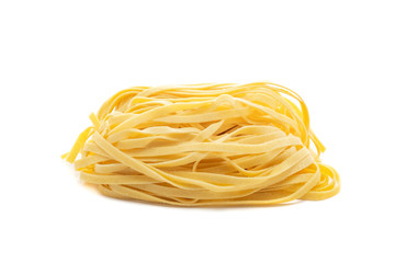 Wall Mural - Fresh uncooked tagliolini pasta isolated on a white background