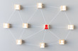 © Shutter B - Top view of Wooden block with people icon on gray background. Leadership with idea and innovation, business teamwork, connection, team building concept.