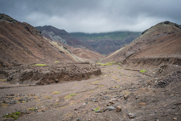 Dry river bed and rocky outcrops at Sandy Bay, St Helena