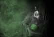 Man in a gas mask in the toxic smoke