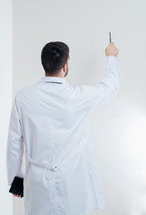 Doctor man backs on a white background