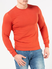 man in a red turtleneck with long sleeves on a white background, layout, copy of space