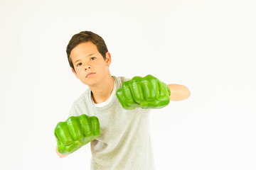 Young boy with giant green hands