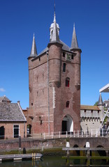 Wall Mural - Gothic Zuidhavenpoort city gate with its brick tower in the old town of Zierikzee, Netherlands