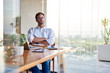 © marvent - Young businessman deep in thought while working at a table