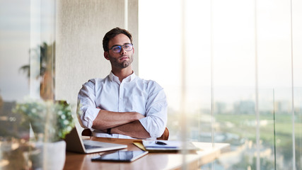 Businessman deep in thought while working from home