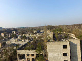 Wall Mural - Drone quadrocopter explores an abandoned industrial complex.Kiev Region