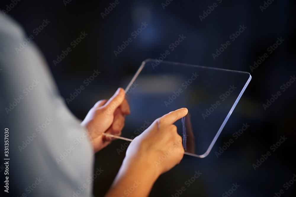 business, people and technology concept - close up of hands with transparent tablet pc computer - obrazy, fototapety, plakaty 