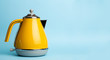 Kettle Background. Electric vintage retro kettle on a colored blue background. Lifestyle and design concept