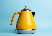 Kettle Background. Electric Vintage Retro Kettle On A Colored Blue Background. Lifestyle And Design Concept