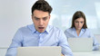 © stockbakers - Shocked Businessman at Work