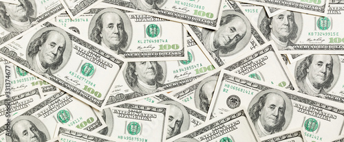 Cuadros en Lienzo Top view of one hundred dollar banknotes made as a background