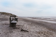 The beach at Henne Strand in Denmark with benches in the foreground