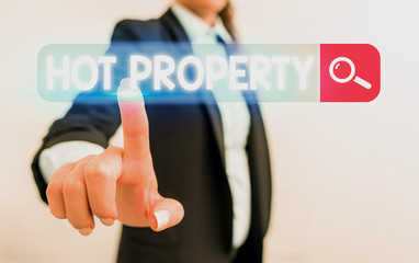 Handwriting text Hot Property. Conceptual photo one that many showing want to buy and it is highly desirable