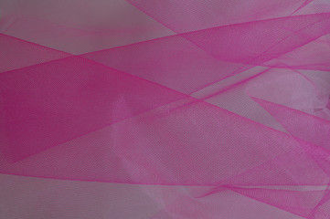  Bright white and pink banground of transparent material with tiny holes
