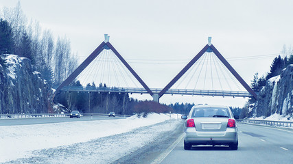 Wall Mural - Car and bridge in road in winter Rovaniemi