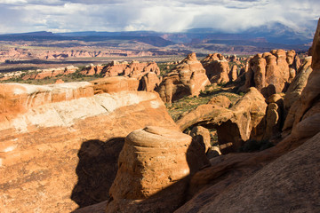 Poster - the desert countryside of arches np with rock formations.