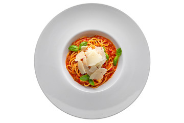 Pasta in tomato sauce with parmesan and basil. Banquet dishes. Isolated on a white background.