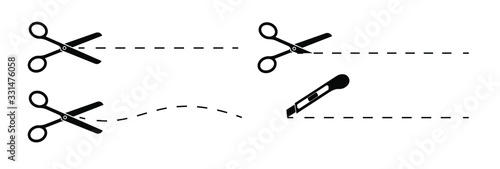 Fotografía Set of scissors and stationery knife with cut lines