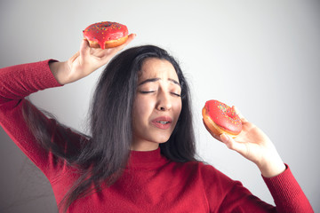 Wall Mural - woman hand holding  Donut