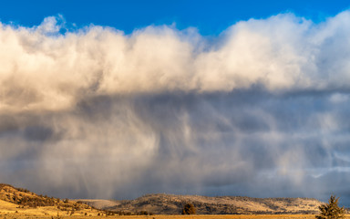 Poster - Storm cell moving over some dry hills in Northern California