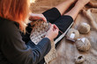 © raffaellagalvani - woman crocheting  a natural linen yarn