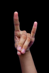 Wall Mural - Isolated hands of a male doing Apana mudra or gesture of vital air also known as digestion mudra on a black colored background, studio shot.