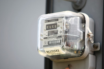 Electricity meter on the electricity post in the village , on 2020 March 14 , Bangkok Thailand