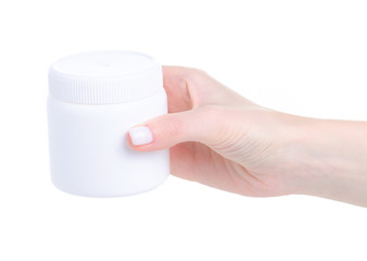 Sticker - White plastic jar in hand on white background isolation