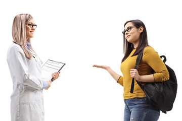 Wall Mural - Student talking to a female doctor